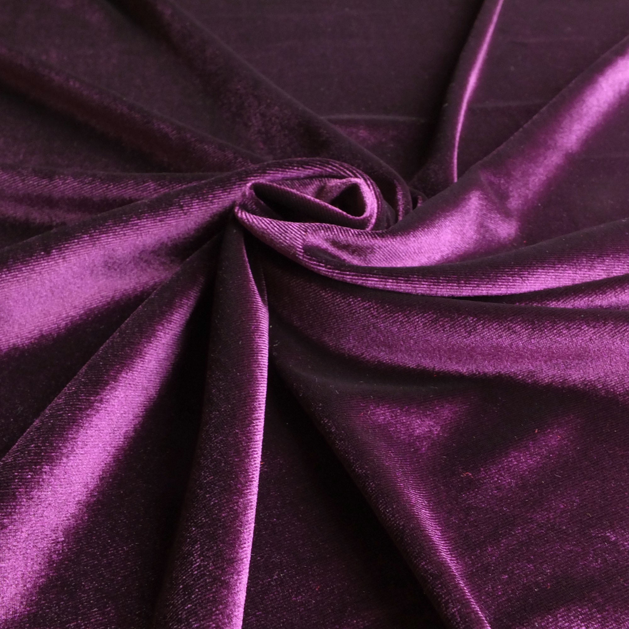 https://www.ontrendfabrics.co.uk/cdn/shop/products/stretch_velvet_fabric_with_lots_of_drape_in_purple_2.jpg?v=1575993060